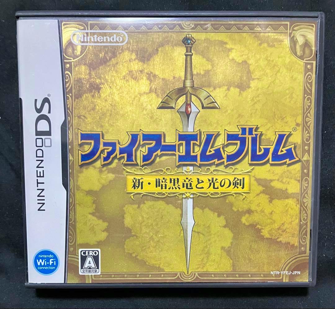 Front cover of the Nintendo DS game case for ファイアーエムブレム 新・暗黒竜と光の剣 showing the game's title and a central sword motif.
