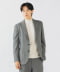Male model wearing a light gray flannel three-button men's jacket.