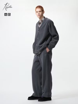 A model wearing fleece wide pants paired with a matching top.