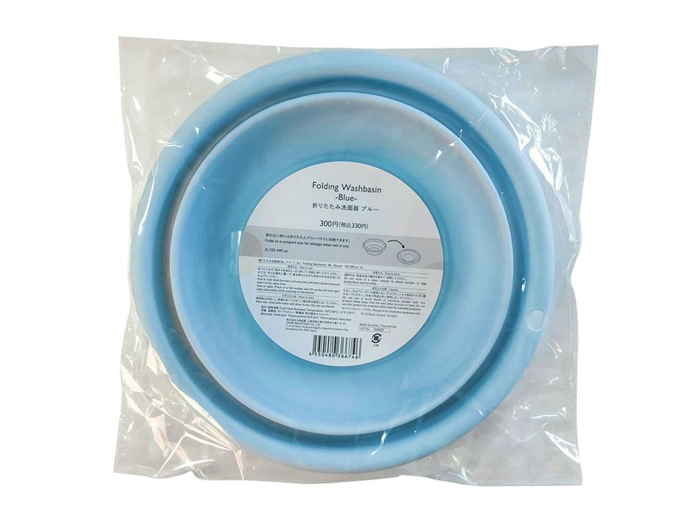 Packaged blue foldable plastic wash basin shown in a clear plastic bag with the label visible.