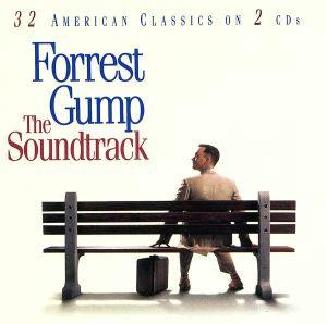 Cover art for the Forrest Gump soundtrack CD showing a man seated on a bench with a suitcase beside him and the title text.
