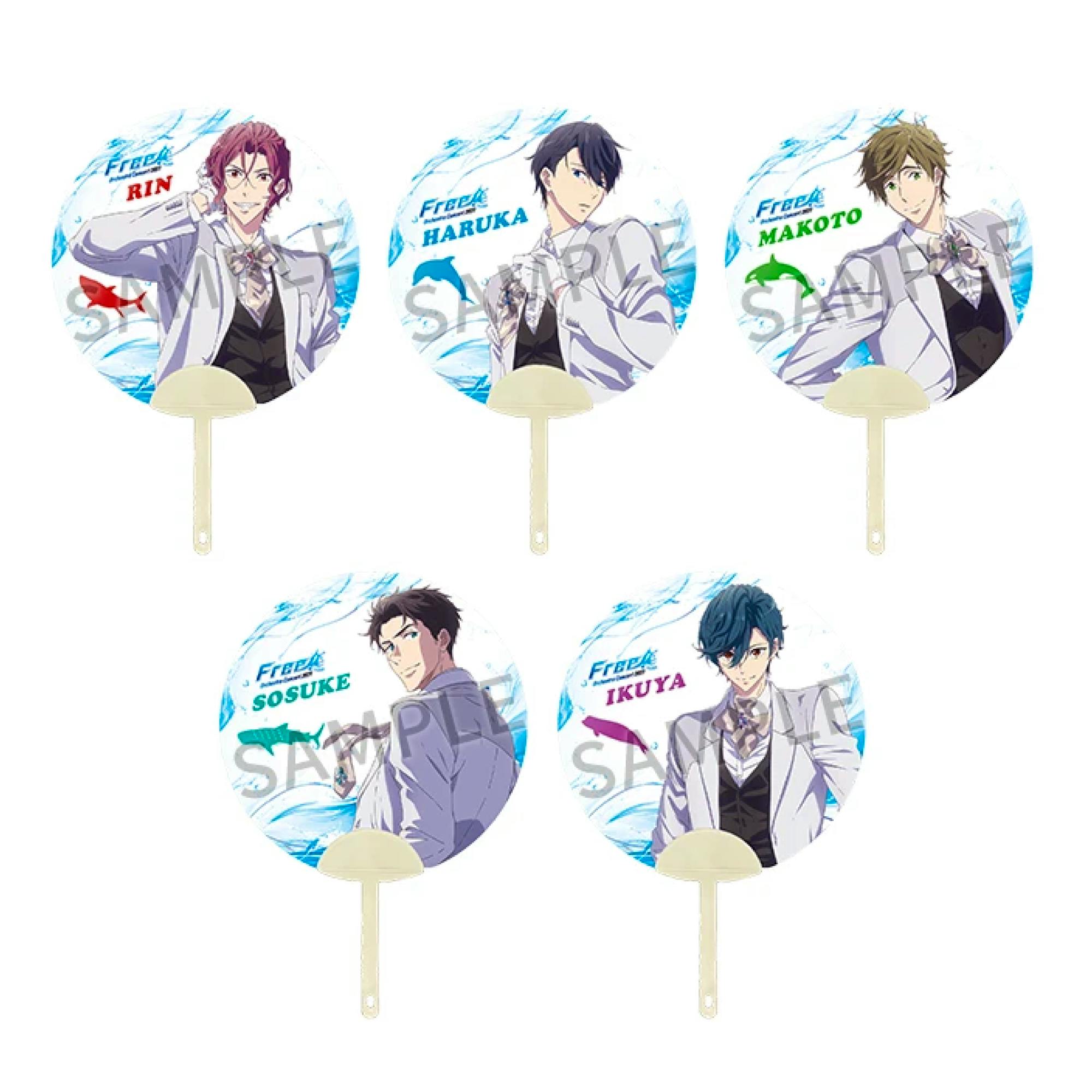 Clear plastic handheld fans with circular faces showing illustrated Free! characters, arranged in two rows.