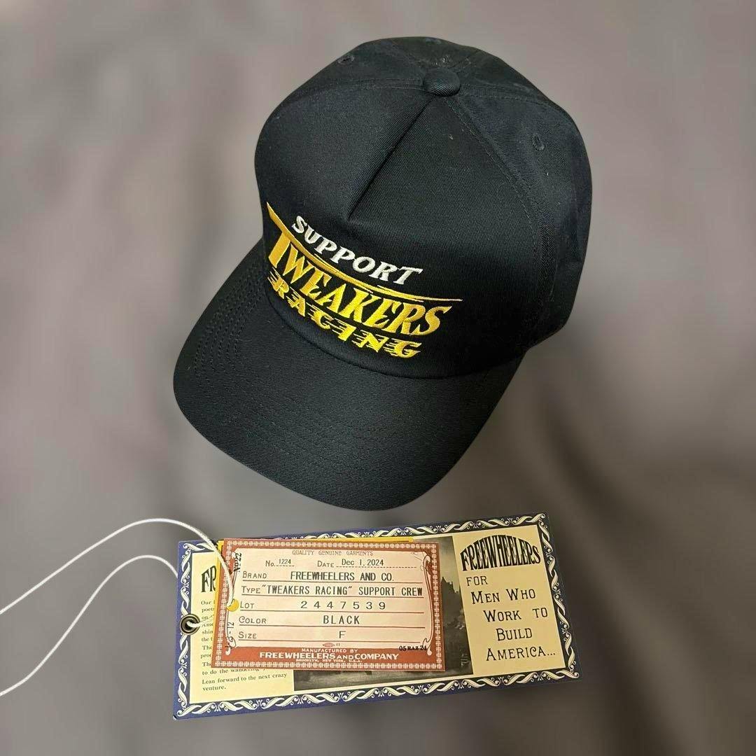 Black FREEWHEELERS "TWEAKERS RACING" embroidered cap photographed with its product tag.
