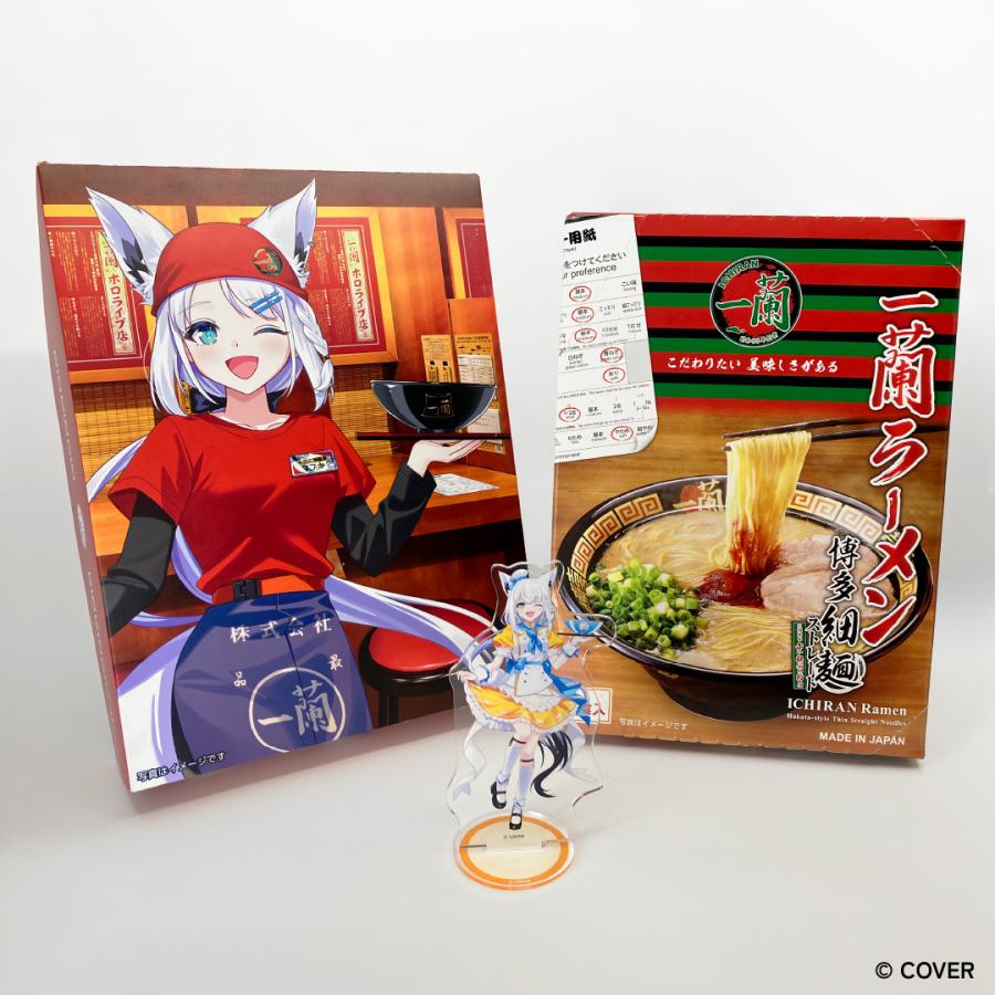 Boxed Ichiran Hakata thin dried ramen set with collaboration illustrated packaging and the included acrylic character stand displayed in front.