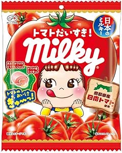 Front of packaged Fuji Milky tomato-flavored sugar candy showing the Milky logo, a cartoon girl, and tomatoes on the wrapper.