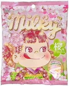Front of a pink Fujiya Milky Cherry Blossom gummy candy 2.2 oz bag showing the Milky logo, a girl's face illustration, and cherry blossom artwork.