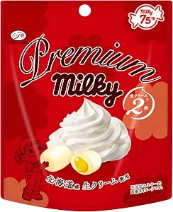 Red Fujiya Premium Milky candy package showing the product name and an illustration of cream-filled candies.