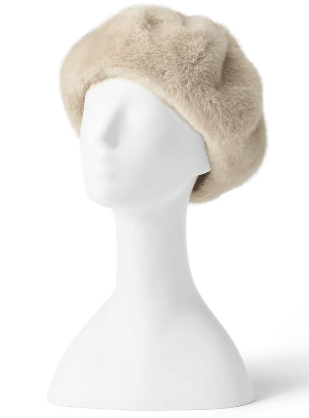 Beige polyester fur beret displayed on a white mannequin head.