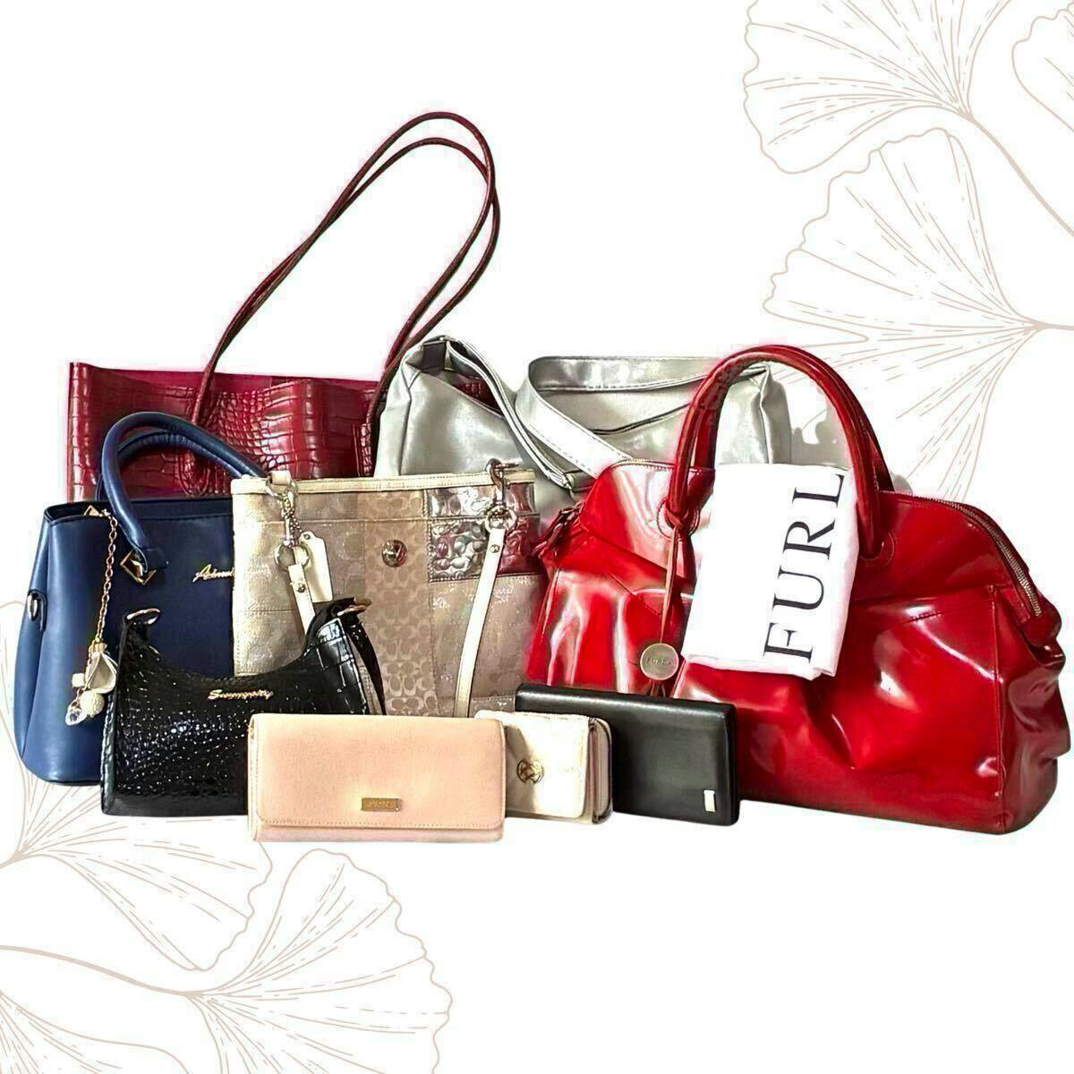 A group of bags and wallets arranged together, including a red Furla handbag and several other bags and wallets.