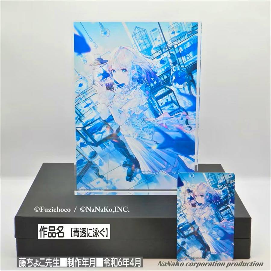 Acrylic panel with a blue-toned anime girl illustration displayed upright on a black box, with a matching small card placed beside it.