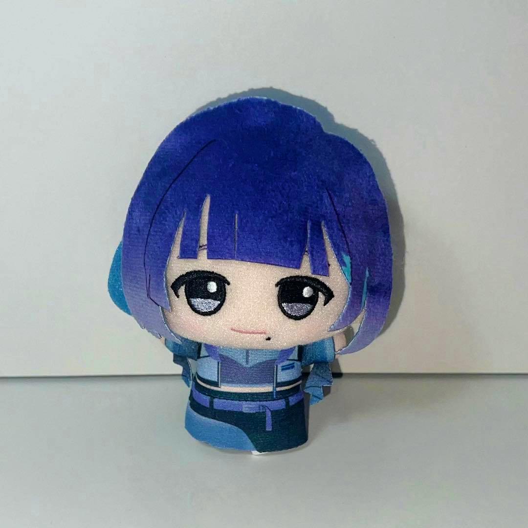 Front view of the 学園アイドルマスター ちびぐるみ on stage! vol.4 秦谷美鈴 plush showing its face, purple hair, and blue outfit.