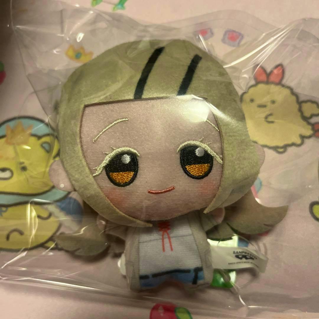 Front view of the plush toy from 学園アイドルマスター 学園生活 vol.3 篠澤広 showing its embroidered face inside plastic packaging.