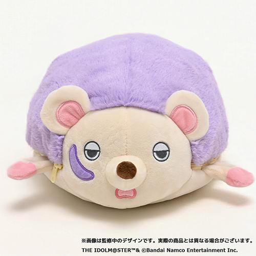Front view of the hedgehog plush with a purple back, beige face, embroidered eyes, and pink paws.