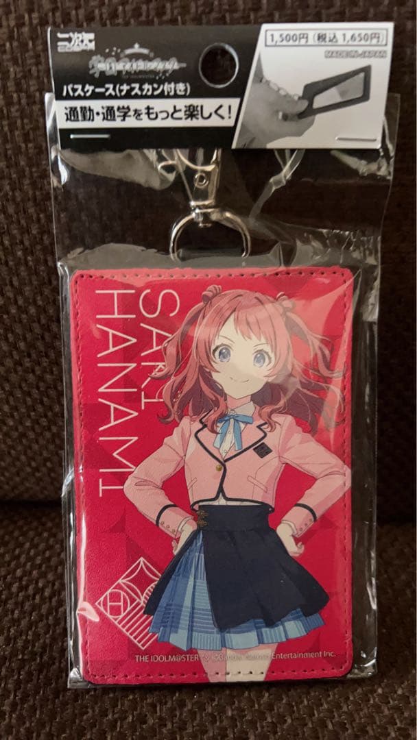 Packaged pass case (花海咲季) from 学園アイドルマスター showing the character artwork on a pink case with attached metal clasp.