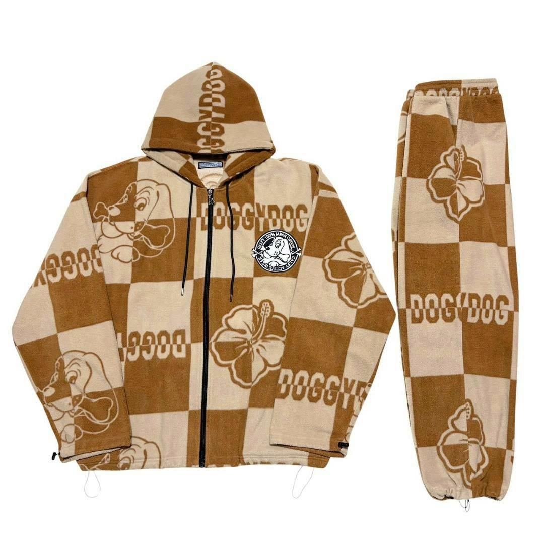 Flat lay of a brown and beige checkered hooded jacket and matching pants featuring hibiscus and dog applique embroidery.