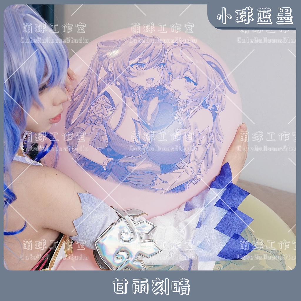 Close-up of a pink balloon showing a blue-ink illustration of Ganyu and Keqing held by a person in costume.