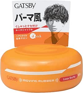 Orange round jar of GATSBY Moving Rubber "Loose Shuffle" hair wax shown in front of its product box with branding and a male illustration.