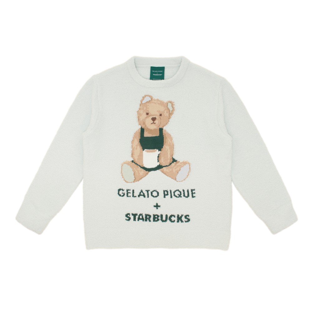 Front view of a mint-green pullover showing a seated teddy bear graphic and the text "GELATO PIQUE + STARBUCKS".