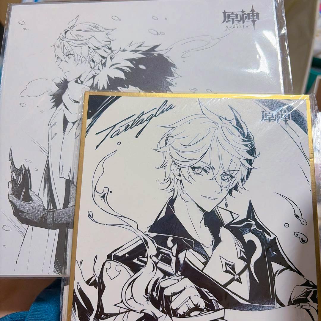 Two Genshin Tartaglia shikishi art boards, one close-up portrait in front and a profile sketch visible behind.