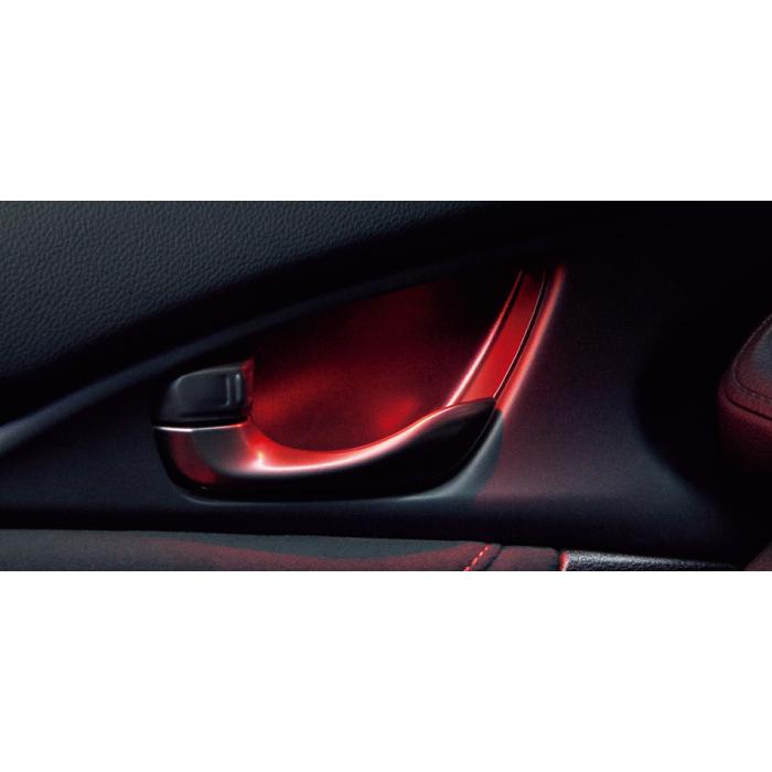 Inner car door handle and door pocket area illuminated with red LED lighting on a vehicle door.