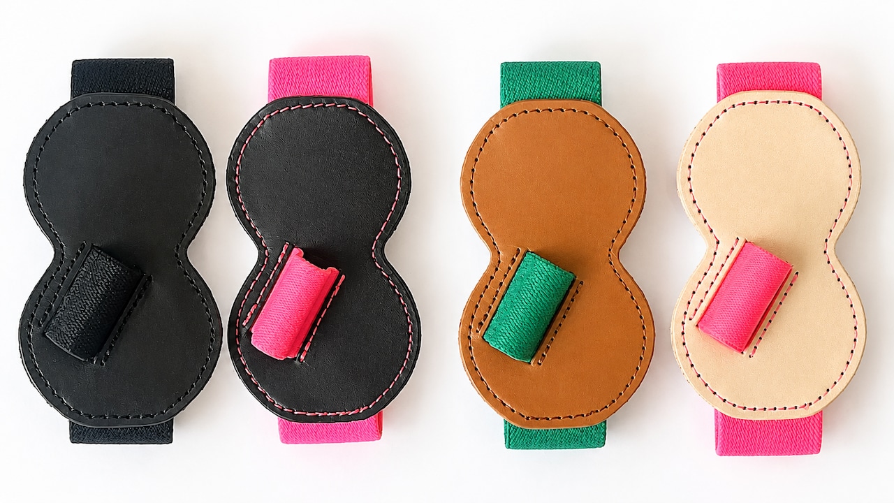 Four cow-leather Pen Together bands for A7 notebook covers in different colors displayed on a white background.
