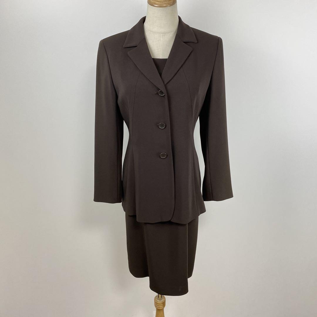 Front view of a brown GERARD DAREL formal women's set (jacket and skirt) displayed on a mannequin.