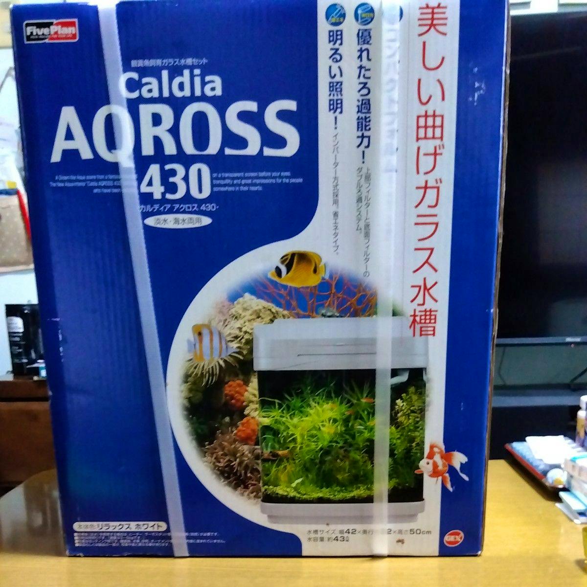 Retail box for the GEX Caldia AQROSS 430 curved glass aquarium showing branding and a photo of the aquarium.