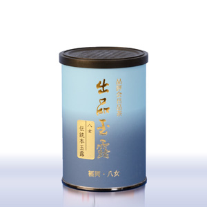 Cylindrical light-blue tea can with gold Japanese lettering and a black lid on a white background.