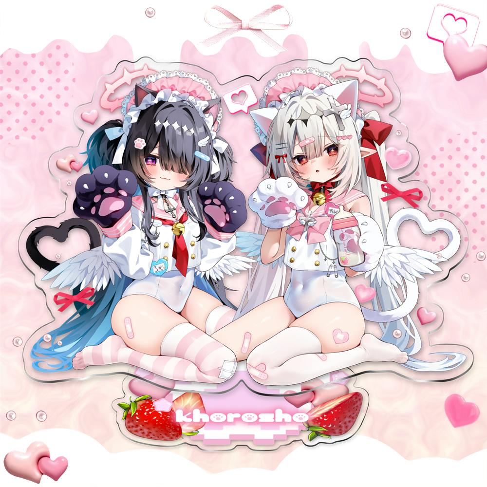 Acrylic stand artwork showing two anime cat-eared girls in white outfits sitting side by side on a pink decorative base.