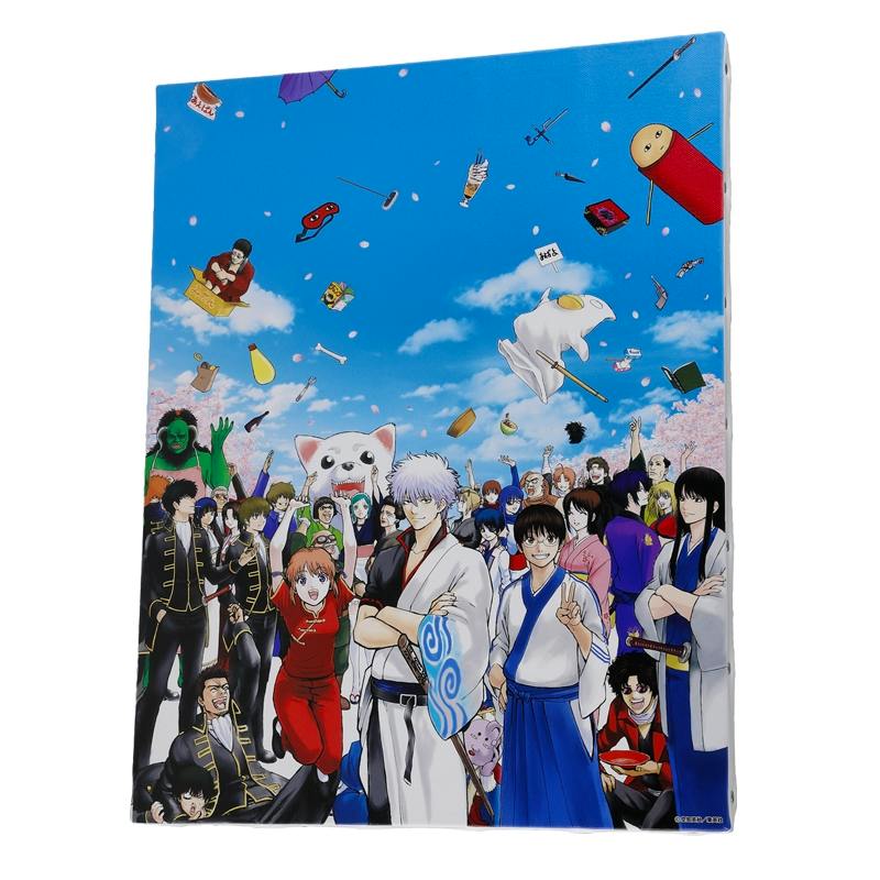 Photograph of the 『銀魂』 BIG artboard showing many illustrated Gintama characters against a blue sky.