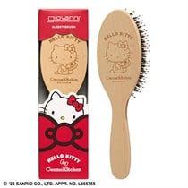 Wooden Hello Kitty hair brush with an engraved Hello Kitty design shown alongside its red-and-beige packaging.