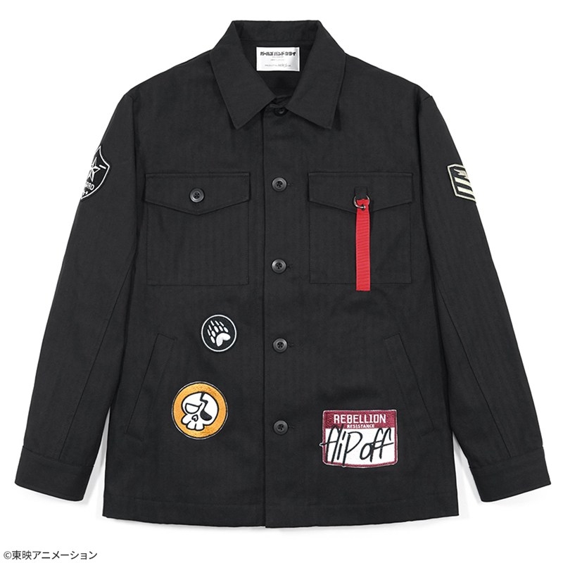 Front view of the black men's cotton jacket (Momoka) showing chest pockets, multiple patches, and a red zipper pull.