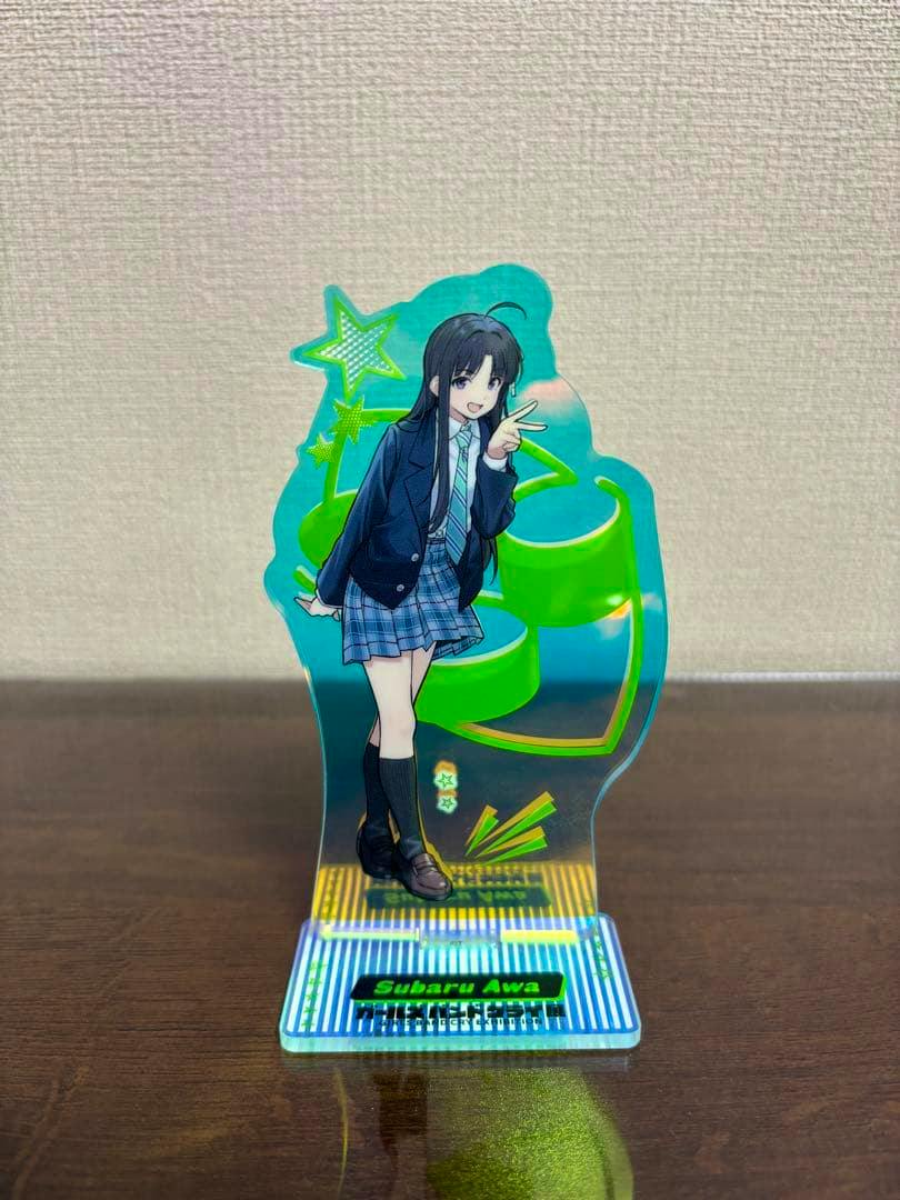 Photograph of the Subaru Awa acrylic display stand from ガールズバンドクライ shown upright on its base.