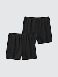 Two black girls' overpants (2-pack) laid flat on a light background.