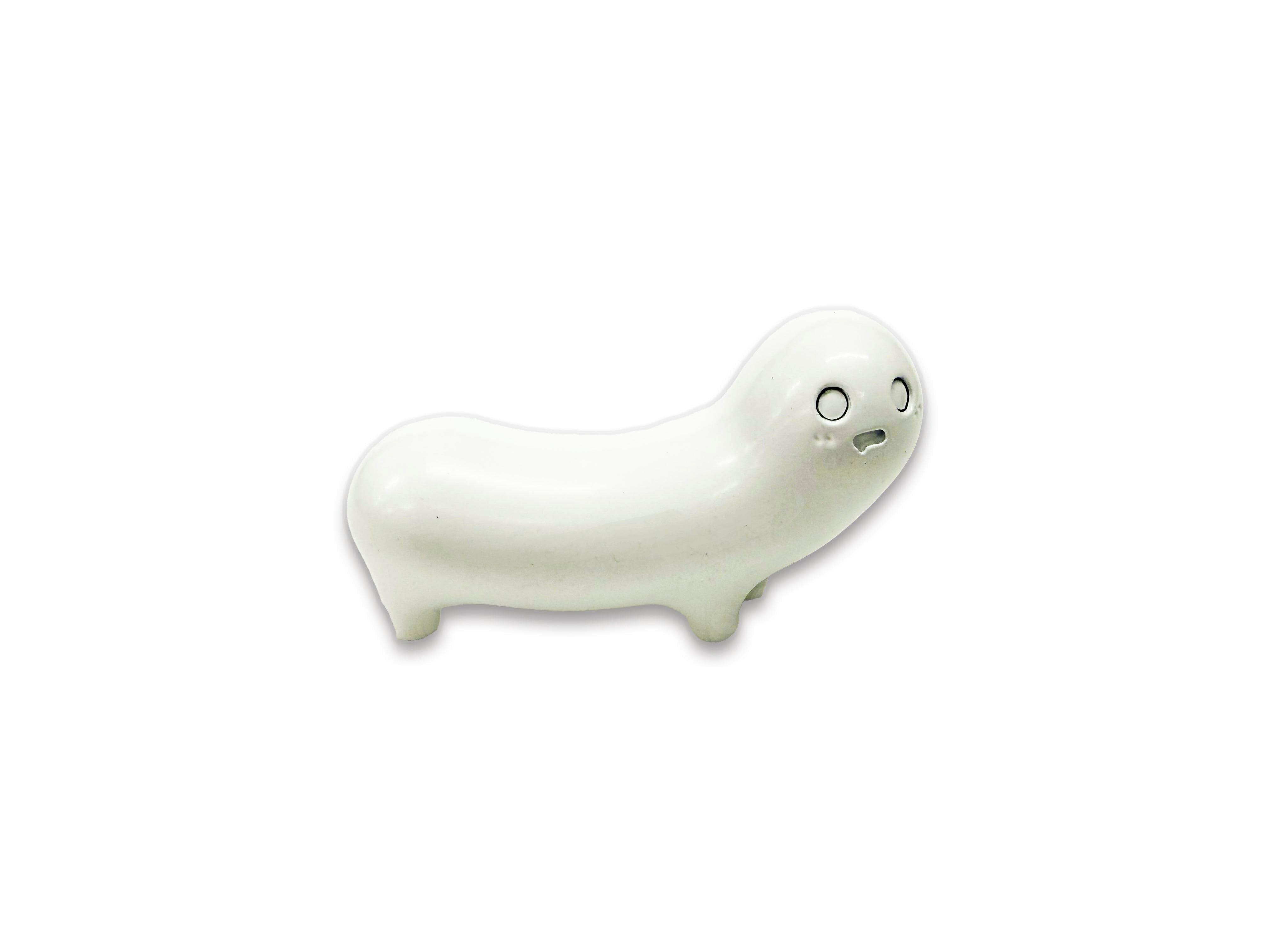 White ceramic Nuko mini figure from 少女終末旅行 shown on a white background.