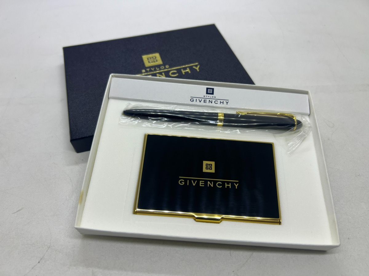 Givenchy ballpoint pen and Givenchy card case displayed together in their presentation box.