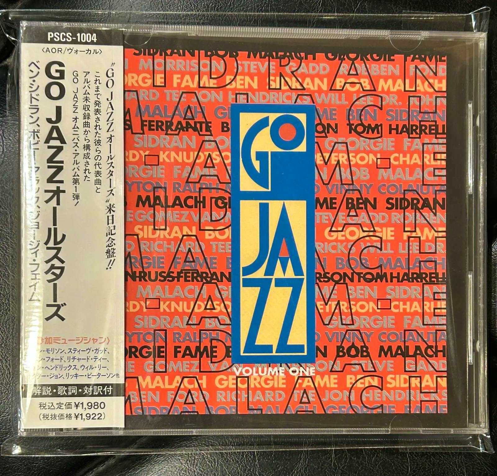 A sealed CD jewel case showing the GO JAZZ Volume One cover with a vertical Japanese obi strip at the left.