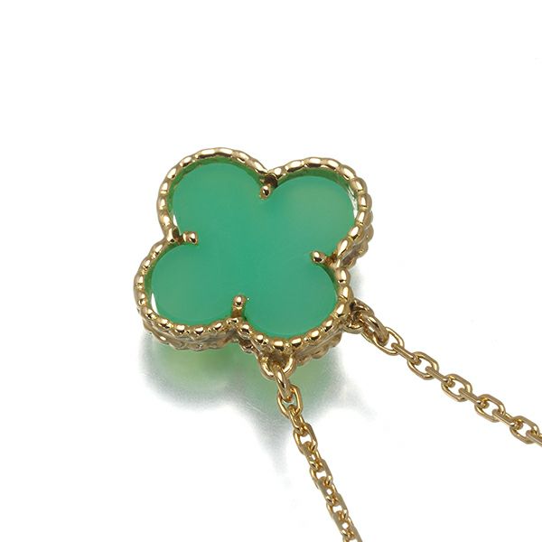 Gold necklace with a green chalcedony clover-shaped pendant on a white background.