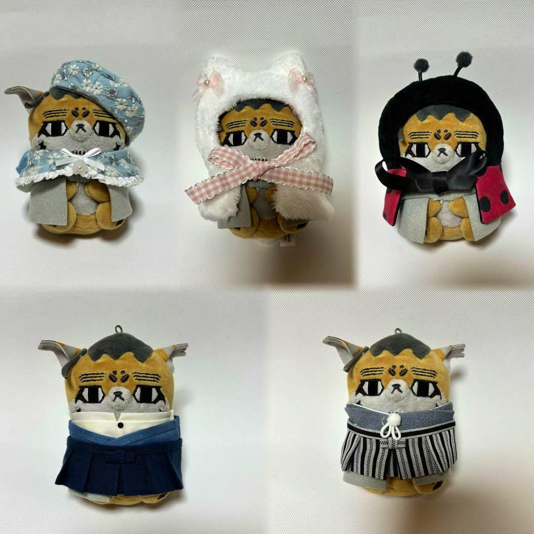 Plush mascot of 尾形百之助 from ゴールデンカムイ shown in five different outfits on a white background.