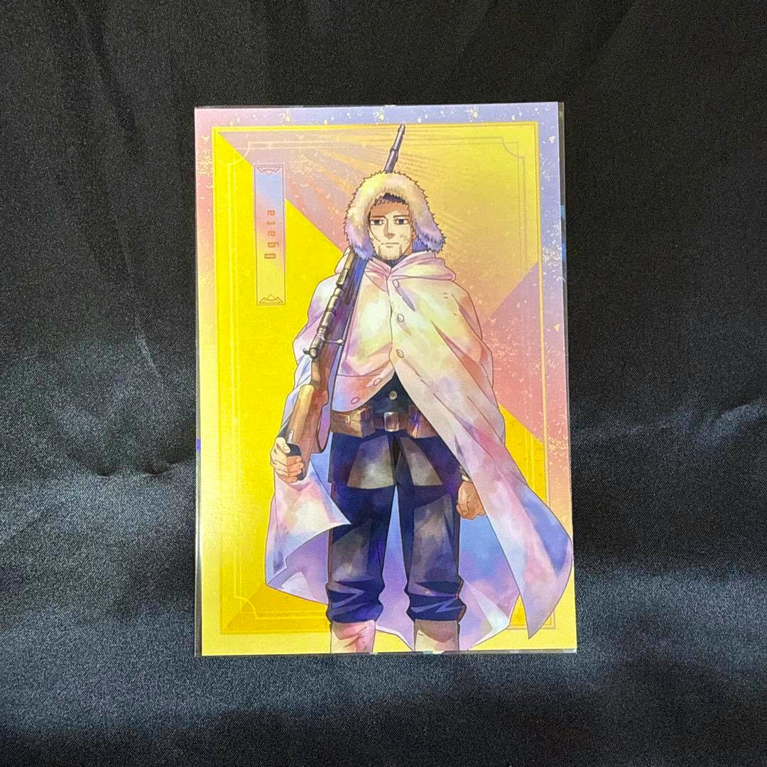 Front of the postcard showing Ogata Hyakunosuke from Golden Kamuy wearing a fur-lined hooded cloak and holding a rifle against a yellow background.