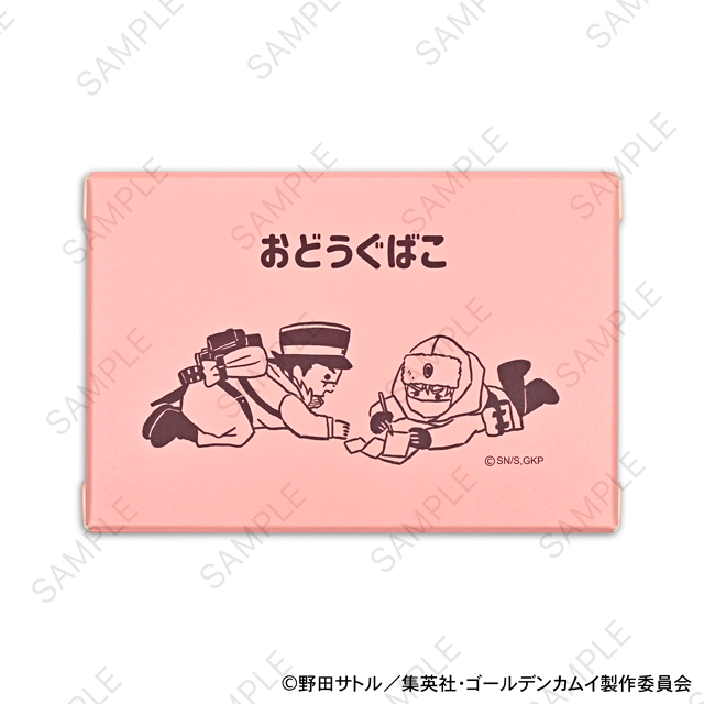 Closed pink steel box with the Japanese text おどうぐばこ and two cartoon characters printed on the lid.