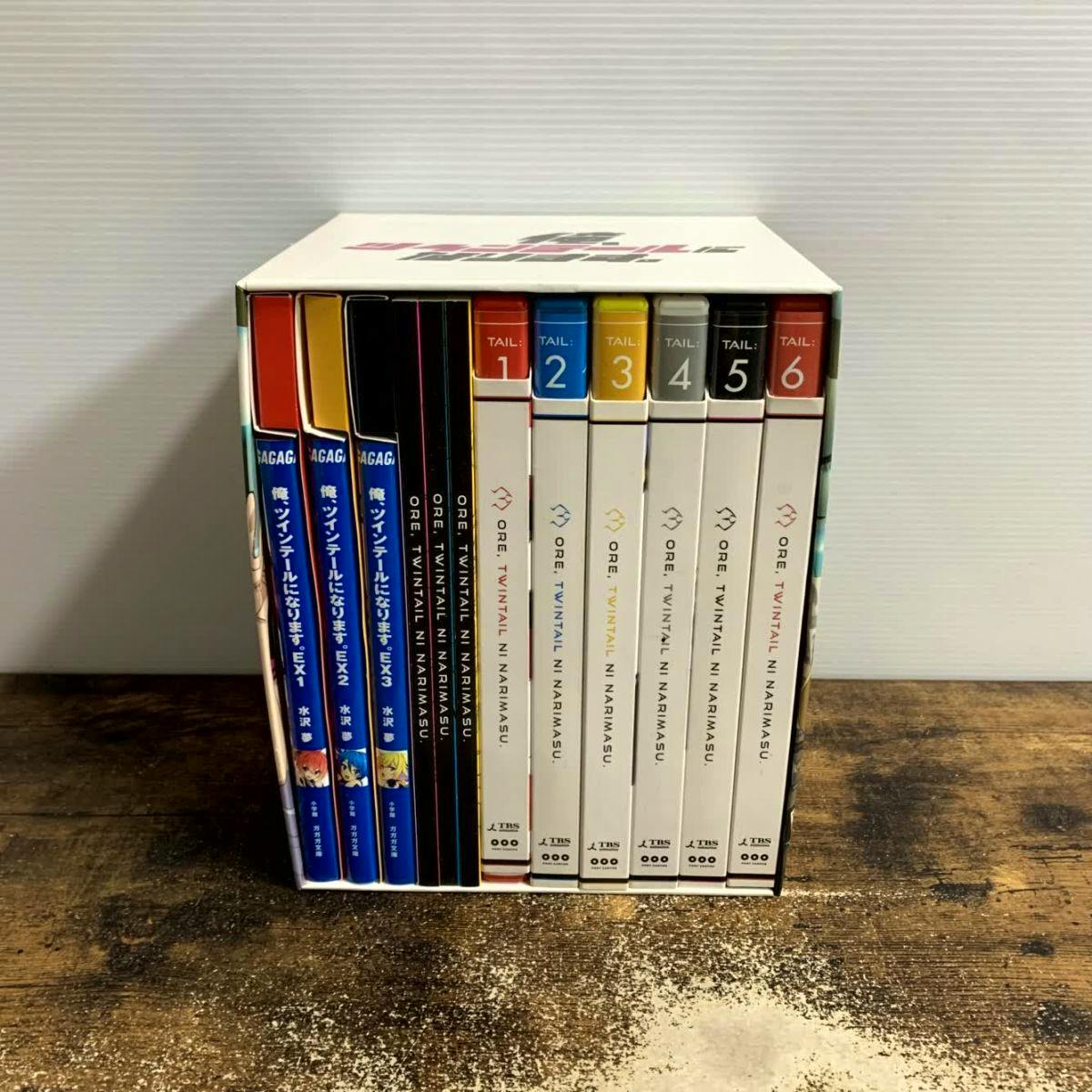 Front view of the boxed Blu-ray set for "俺、ツインテールになります。" showing the spines of the six volumes inside the storage box.