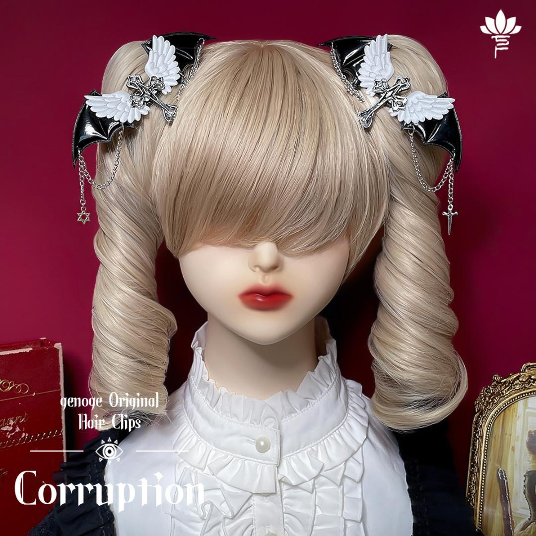 Mannequin head with curled blonde pigtails wearing two gothic bat-wing hair clips with white wings and dangling chains.
