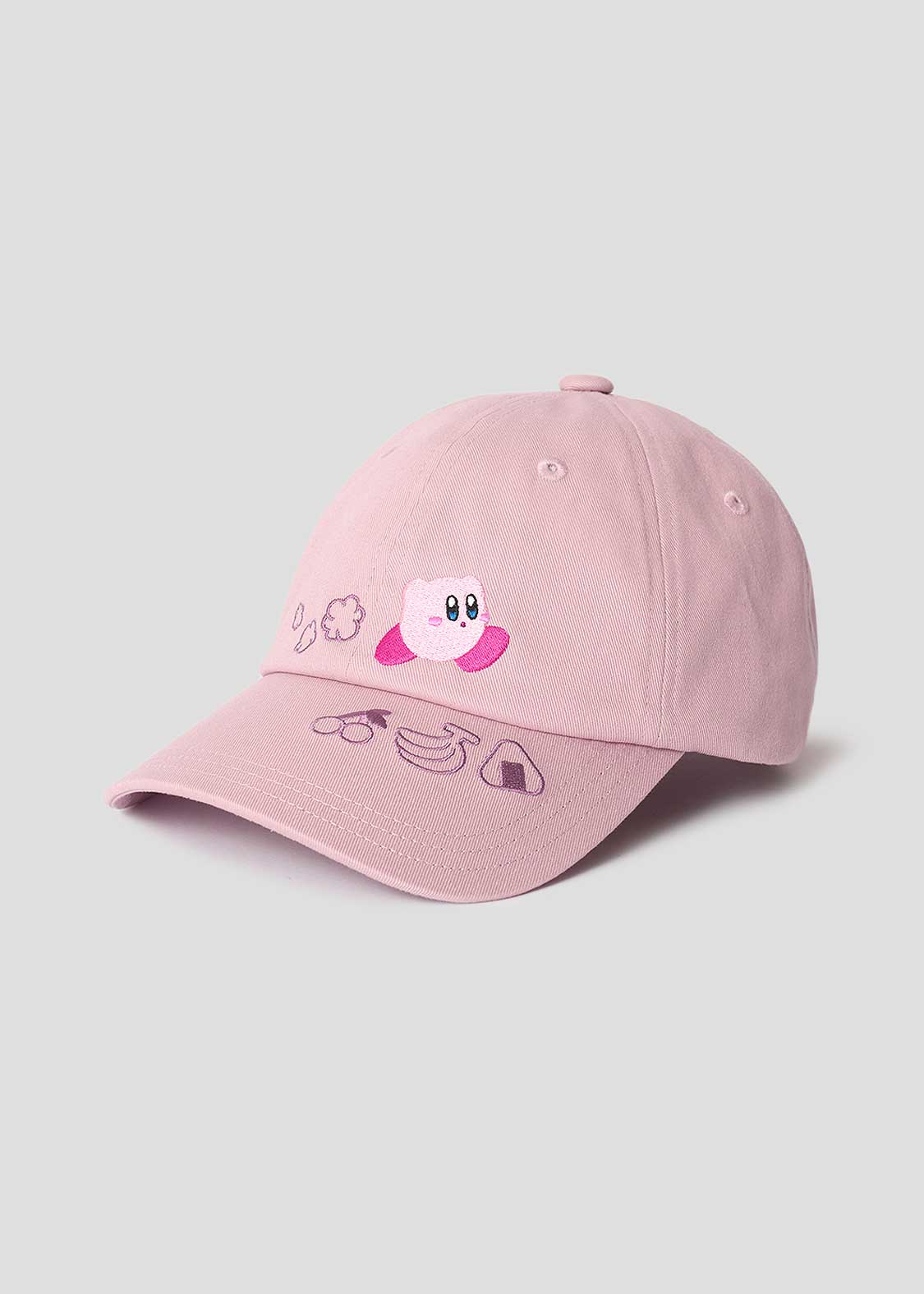 Pink cotton baseball cap featuring a small cartoon character on the front and food-themed icons printed on the brim.