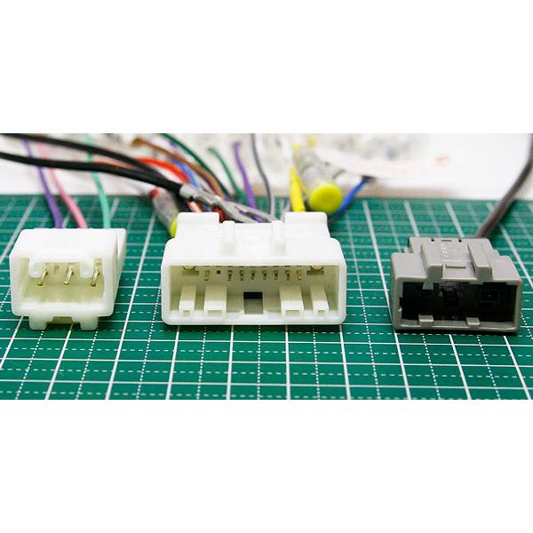Close-up of three vehicle wiring harness connectors and attached wires for the GR86/BRZ navigation power harness.