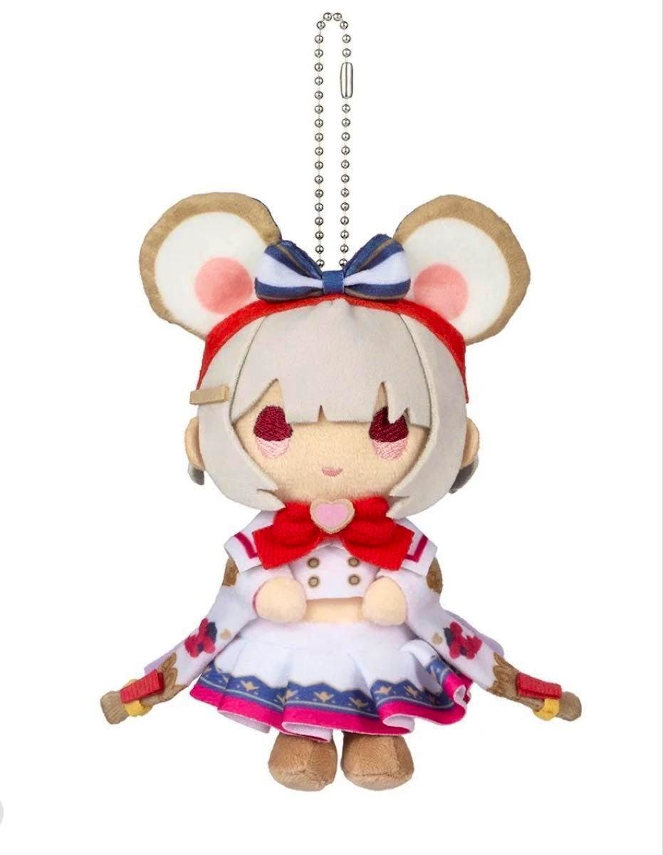 Front view of the seated plush mascot keychain on a white background, showing the character with large round ears, a striped bow, red collar bow, and a patterned skirt.