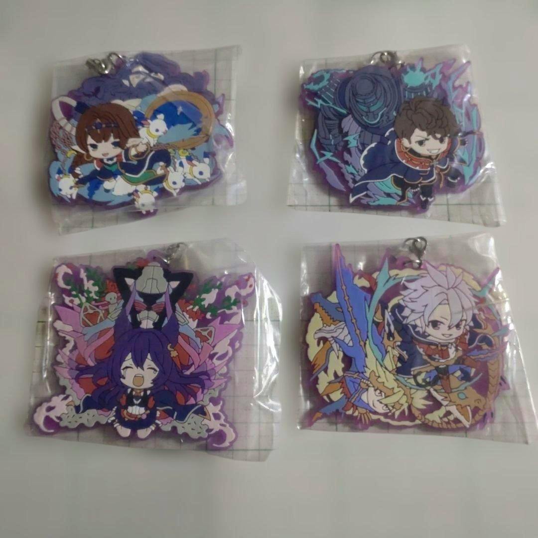 Four Granblue Fantasy Grafes 2019 Ten Sages rubber strap charms in individual plastic packaging arranged in a 2×2 layout on a white surface.