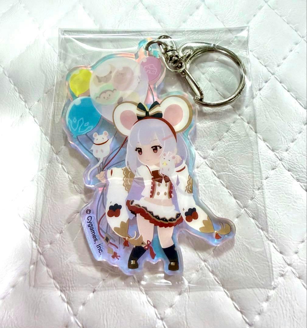 Packaged aurora acrylic keychain of the Granblue Fantasy character “ビカラ” with a metal key ring on a white quilted background.