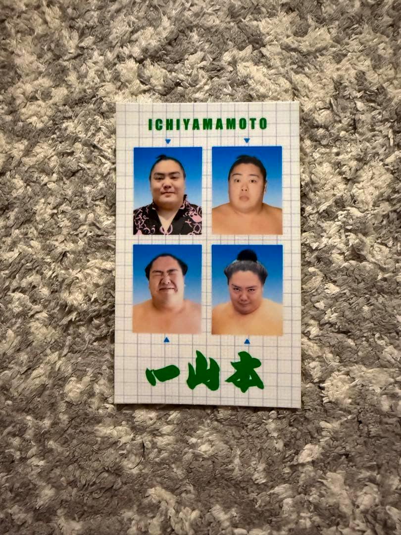 A sticker sheet showing four passport-style headshot photos of Ichiyamamoto with his name printed at the top.