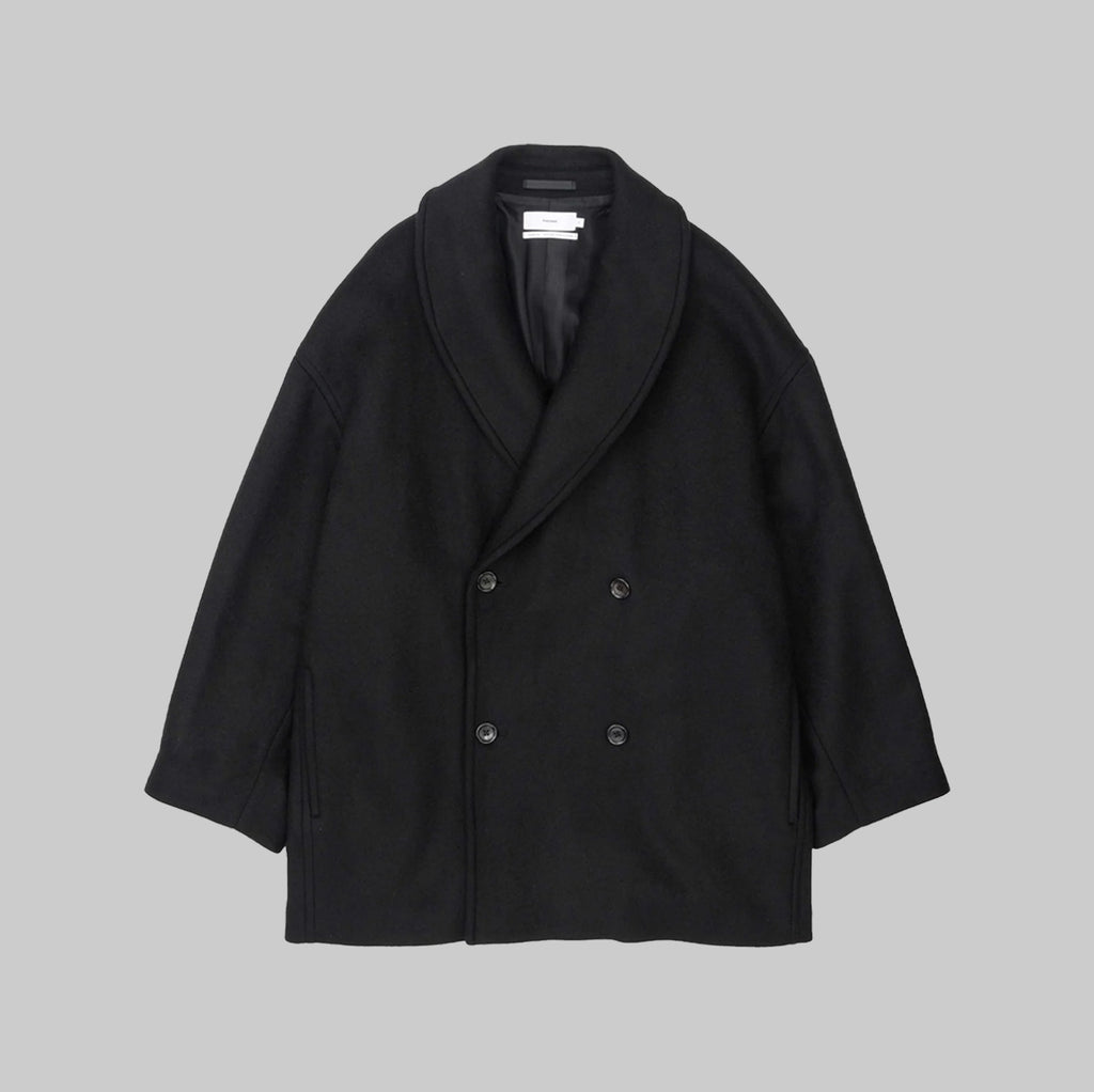 Front view of a black Graphpaper light Melton shawl collar double-breasted men's wool coat laid flat on a gray background.